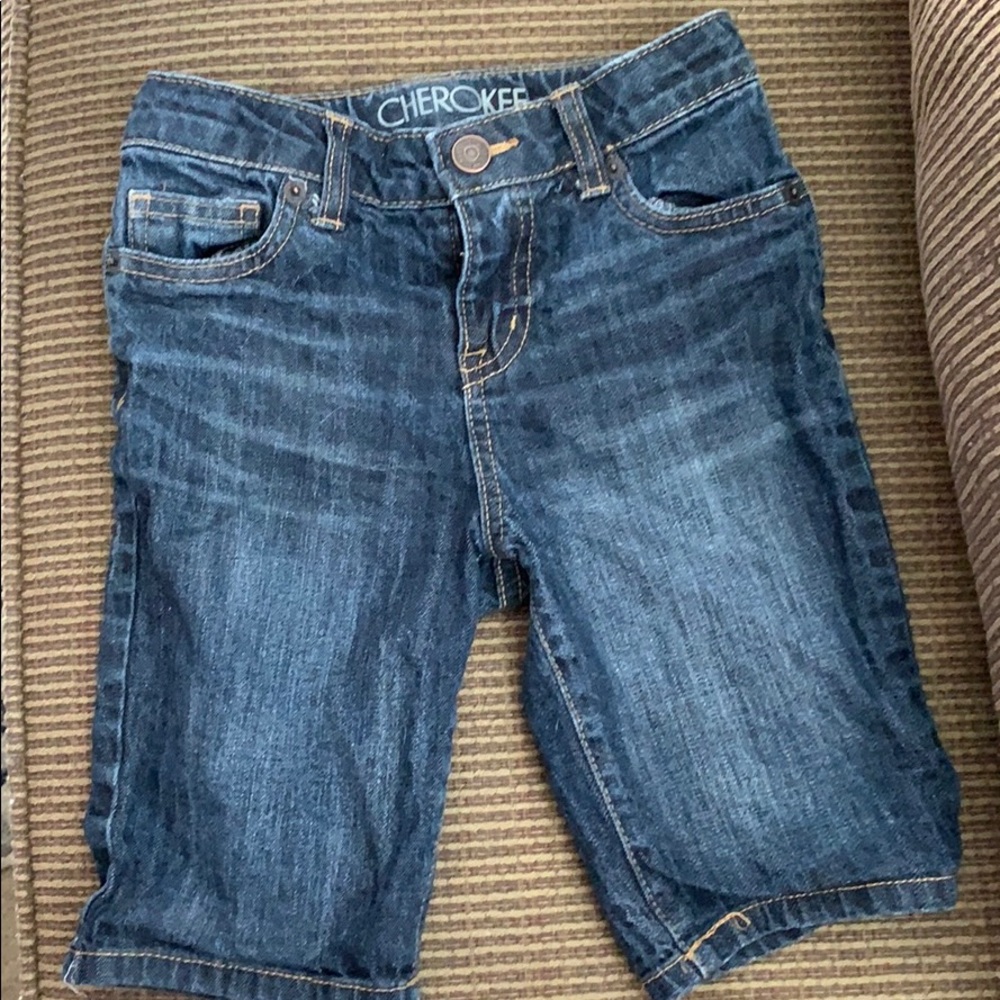 NWOT dark wash blue denim Bermuda style shorts.